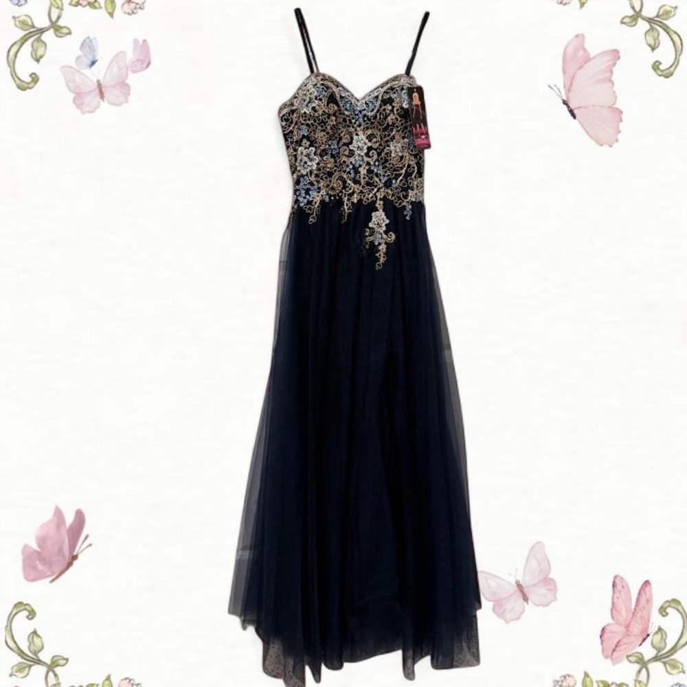 Navy blue tulle A-line gown with gold embroidery, strapless, and ribbon back